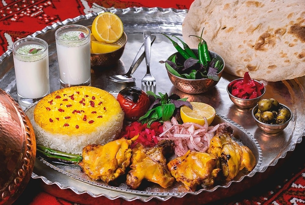 Iranian street food vendor preparing fresh falafel